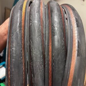 FOUR NEW Continental Grand Prix Black/transparent tires.